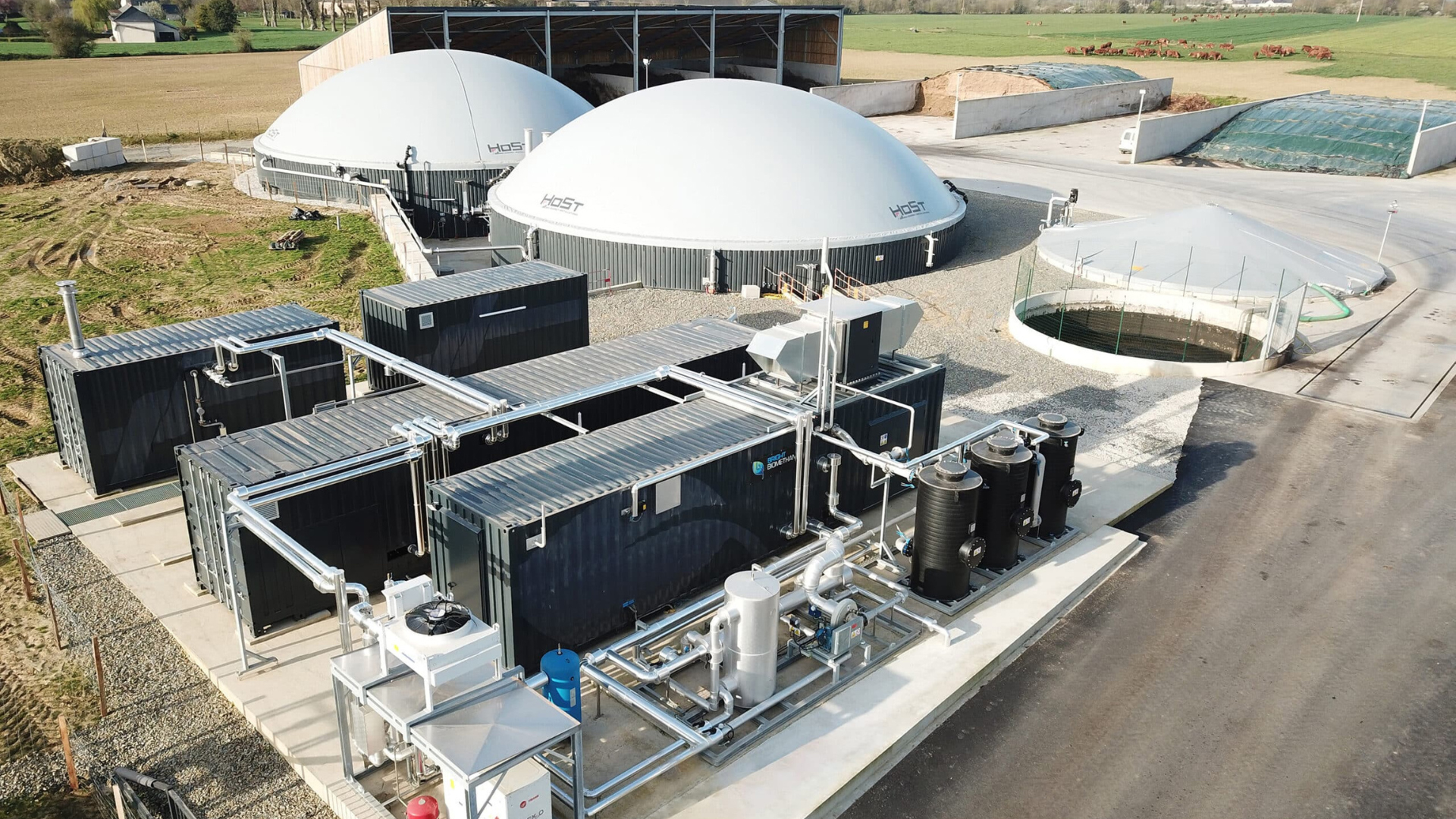 Rural biogas plant with anaerobic digesters and renewable energy equipment